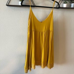 Lulu’s yellow-gold sun dress with crochet hem